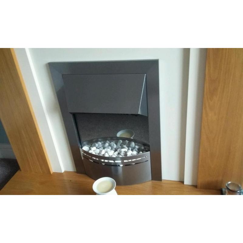 Fire surround and electric dimplex fire