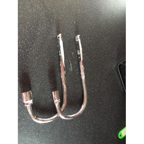 Metal tiebacks