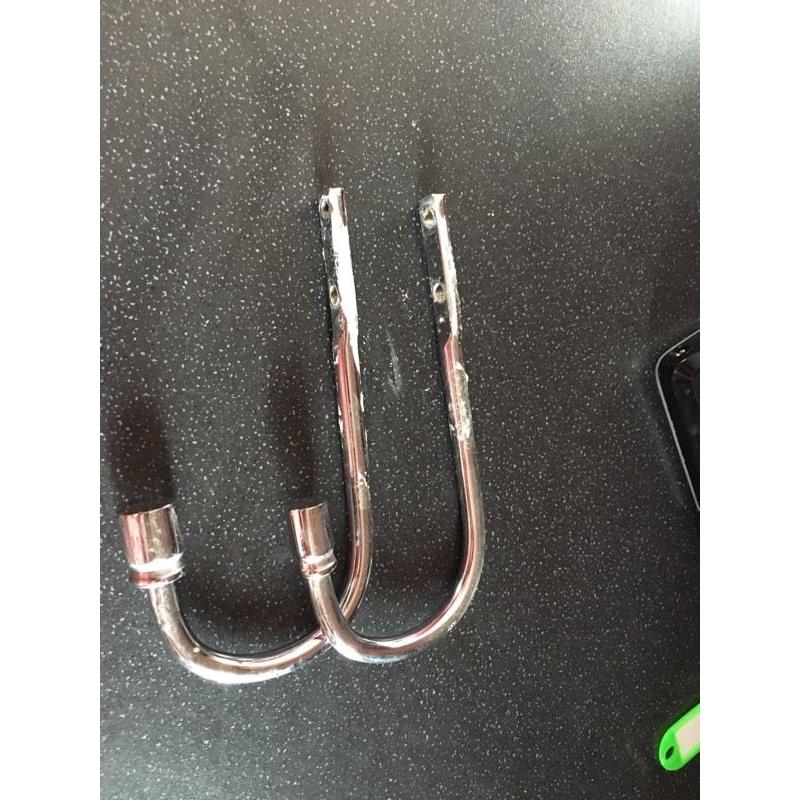 Metal tiebacks