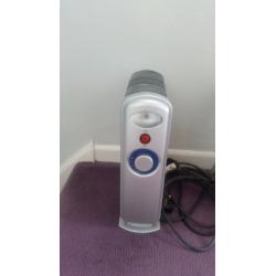 Pair of electric oil filled radiators heaters