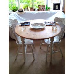 Farmhouse Rustic Shabby Chic Round Table and Two Chairs with Carved Details.