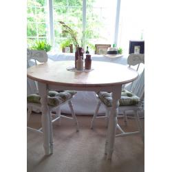 Farmhouse Rustic Shabby Chic Round Table and Two Chairs with Carved Details.