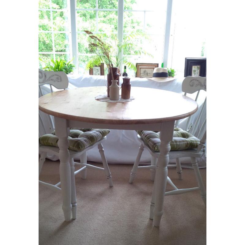 Farmhouse Rustic Shabby Chic Round Table and Two Chairs with Carved Details.
