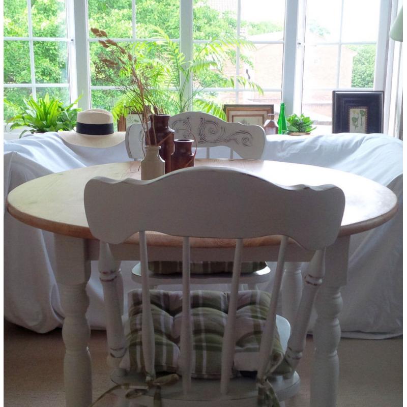 Farmhouse Rustic Shabby Chic Round Table and Two Chairs with Carved Details.