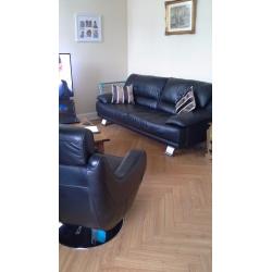 3 seater sofa black leather & 2 LEATHER SWIVEL CHAIRS