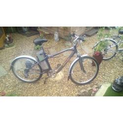 TWO ELECTRIC BIKES