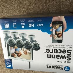 Swann all in one monitor system with monitor and four cameras , wi-fi