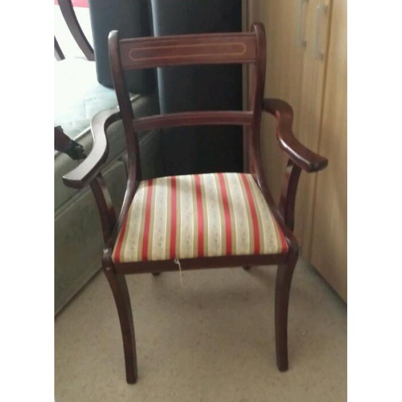 Dining tale and six chairs (2 are carvers)