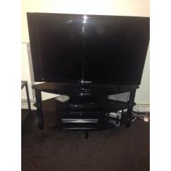 37" SAMSUNG TV AND BLACK GLASS STAND