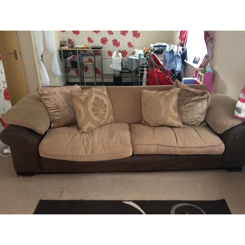 Long brown sofa used