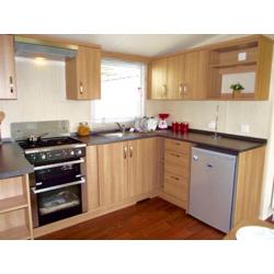 Prestige caravan for sale including deck on beautiful coastal park with seaviews & beach access