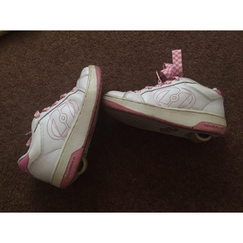 White and pink heelys size 1