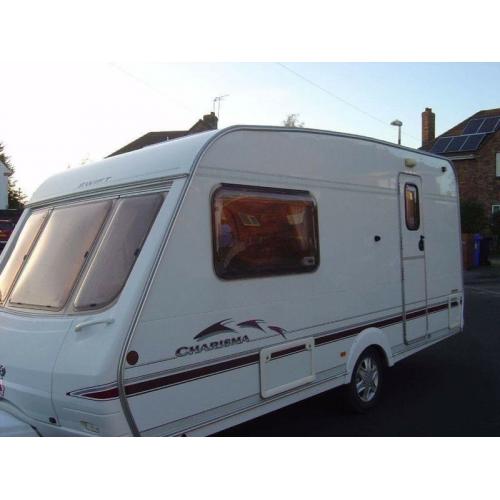 Swift charisma 2004 with moter movers immaculate condition