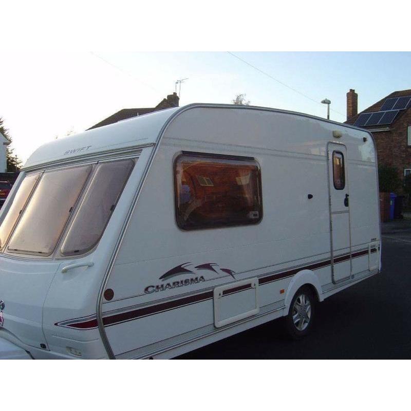 Swift charisma 2004 with moter movers immaculate condition