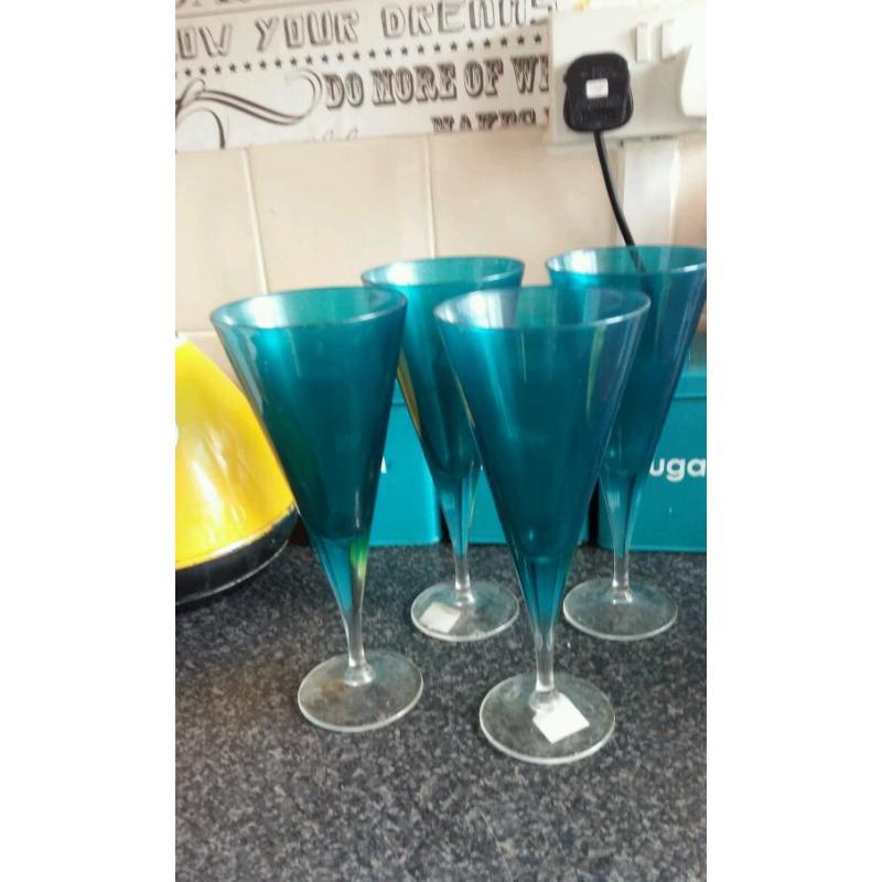 4 teal tall glasses