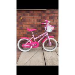 Girls pink bike with white tyres