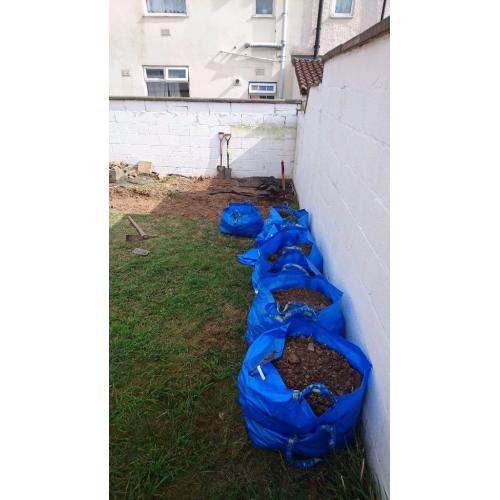 Free topsoil. In small transportable bags.