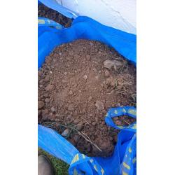 Free topsoil. In small transportable bags.