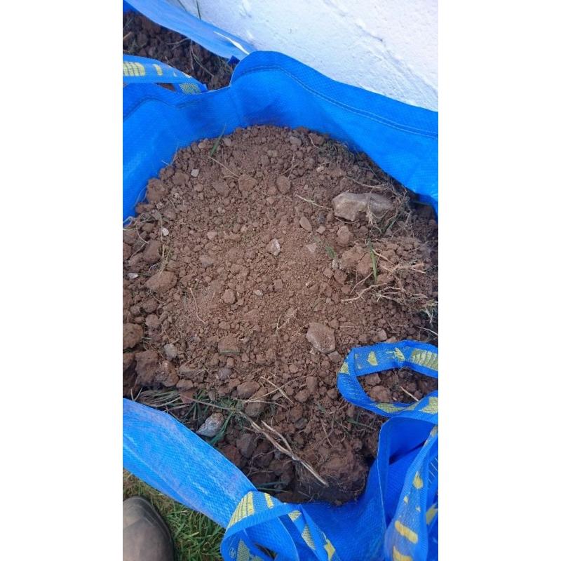 Free topsoil. In small transportable bags.