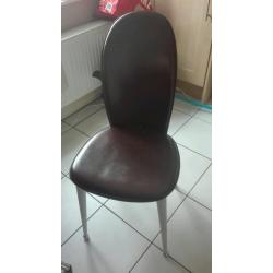 Round dining table and two chairs