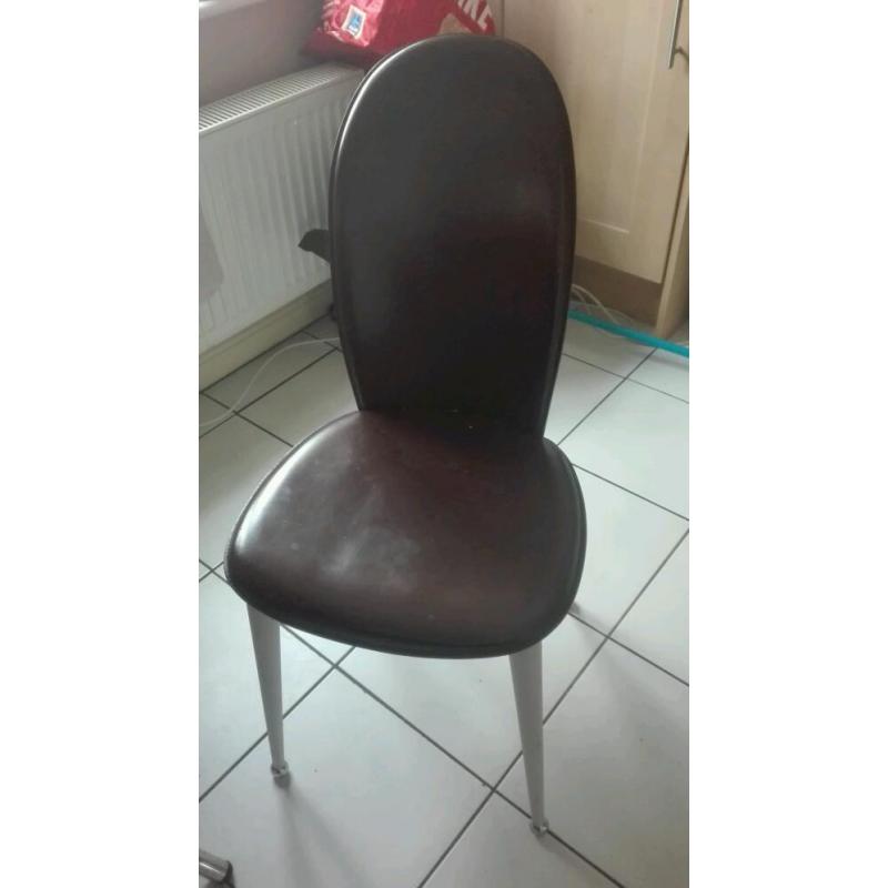 Round dining table and two chairs