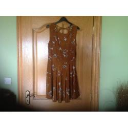 7 Dresses for sale all size 10. 5 with labels, 2 without, all new never worn. Please see all images.