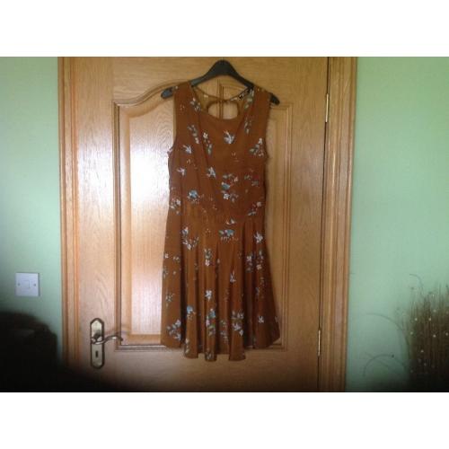 7 Dresses for sale all size 10. 5 with labels, 2 without, all new never worn. Please see all images.