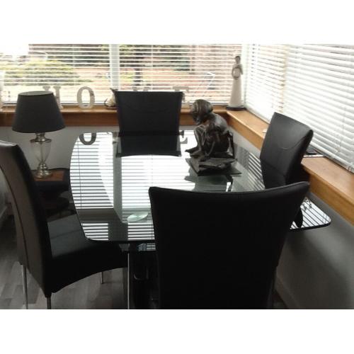 Glass Dining table and faux leather chairs