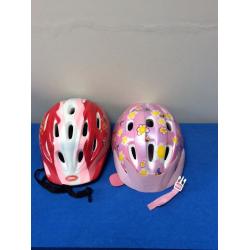 2 kids' bicycle helmets