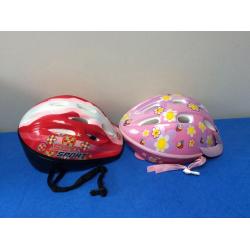 2 kids' bicycle helmets