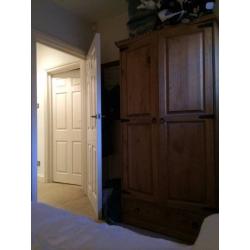 A double room in a large, friendly garden flat