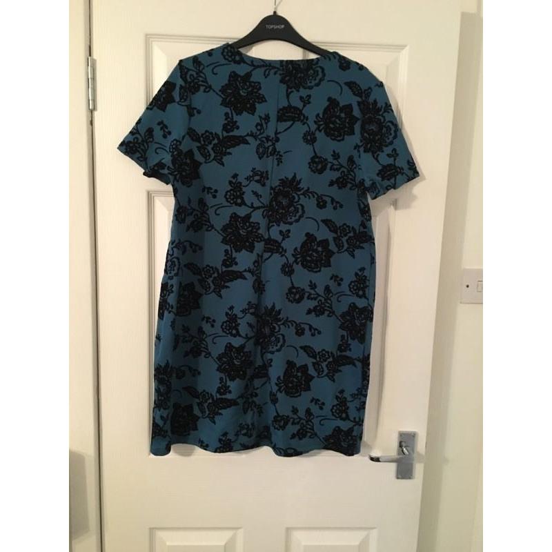 Woman's teal with black velvet flowers, size 16