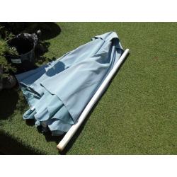 used garden parasol with metal stand