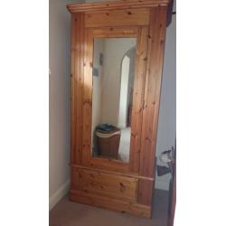 Matching double and single solid pine wardobes