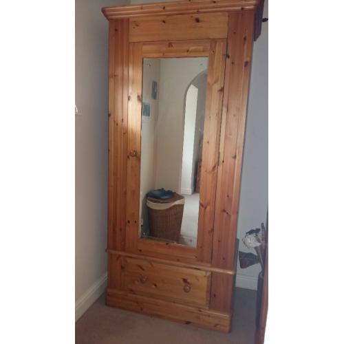 Matching double and single solid pine wardobes