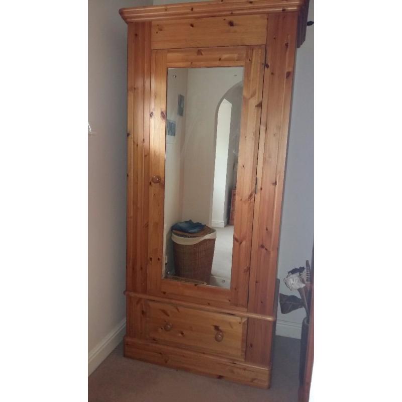 Matching double and single solid pine wardobes