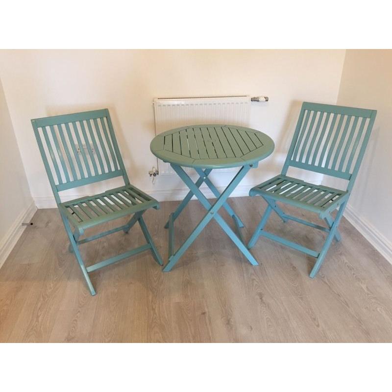 Wooden table and chairs for sale