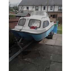 shetland boat and 2 outboards
