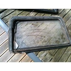 Early VW bay opening rear side window, n/s, for parts or repair