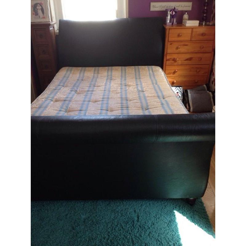 Black leather sleigh bed