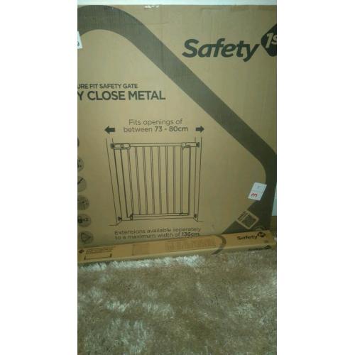 ** Brand new baby gate plus extension **