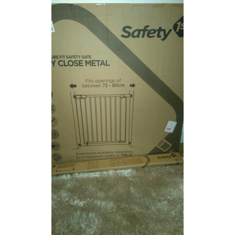 ** Brand new baby gate plus extension **