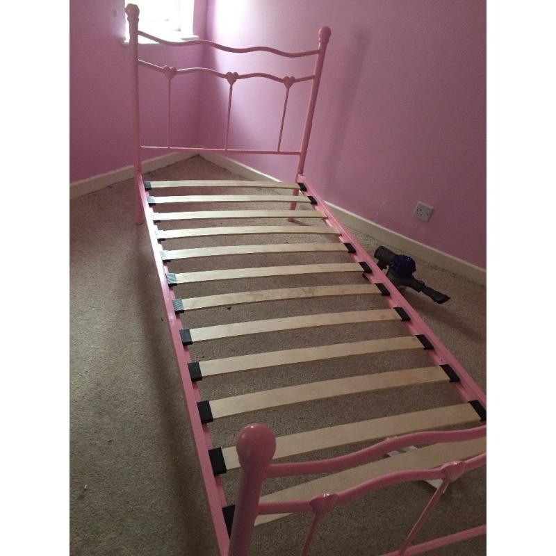 Pink metal single bed