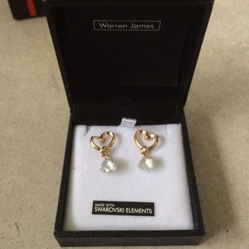 Gold and Swarvski earrings