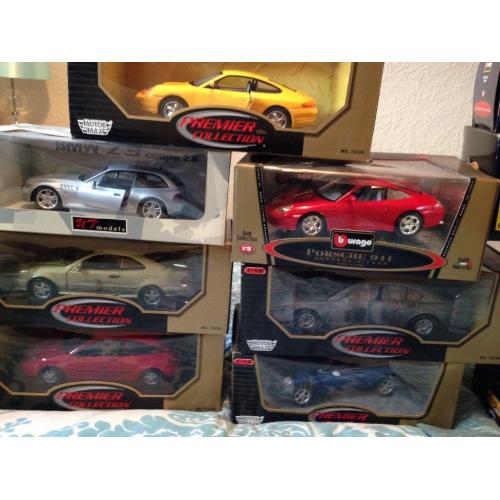 12 model cars mint all box never open
