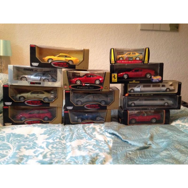 12 model cars mint all box never open