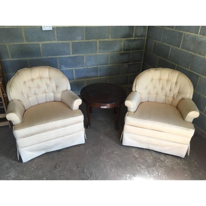 Two arm chairs and side table