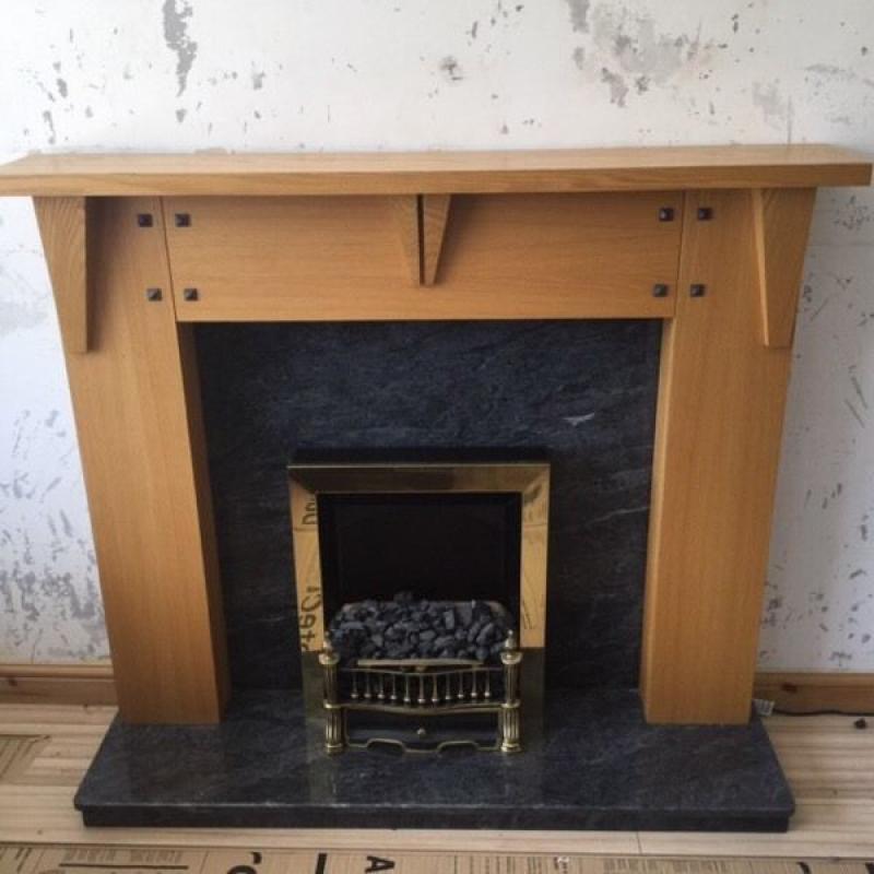Marble and light oak fireplace