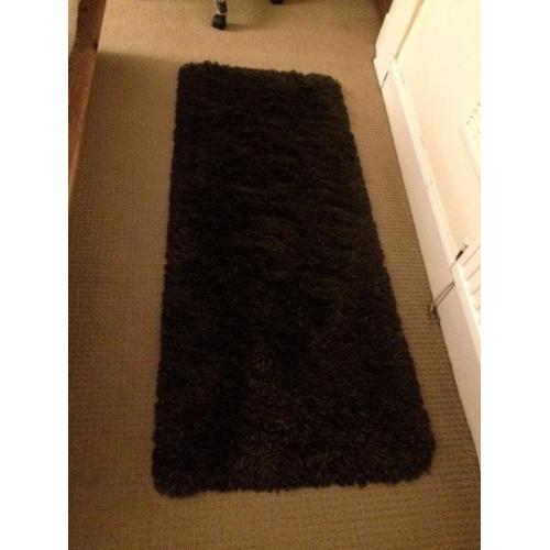 Black Ikea "adhub" rug