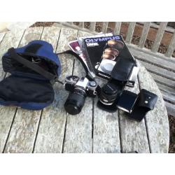 SLR Olympus film camera with 2 lenses and flash